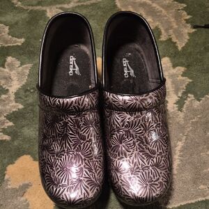 Dansko Black and Silver Floral Clogs